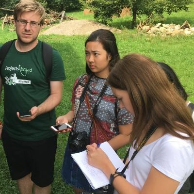 Projects Abroad journalism interns interview a local in Romania Journalism interns in Romania speak to a local